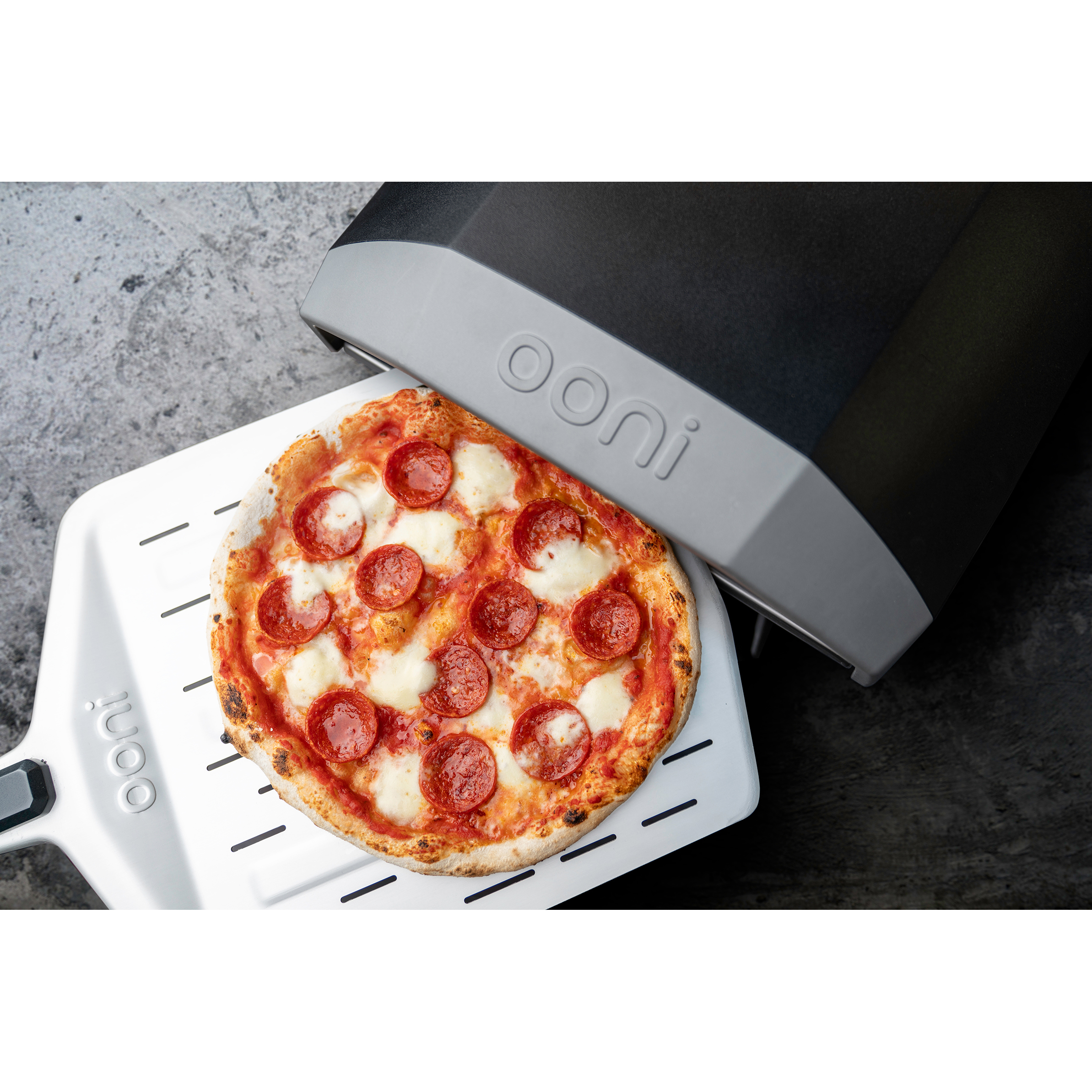 ooni-pizzaschep-geperforeerd-30cm-aluminium